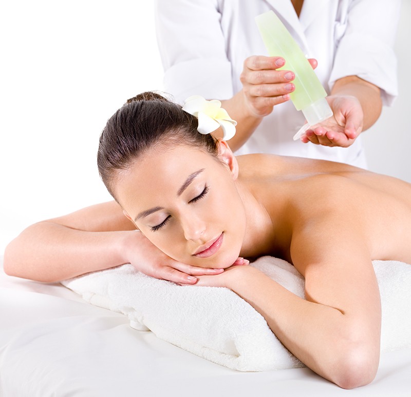 Heathy massage for young woman with aromatic oils - horizontal - Beauty treatment